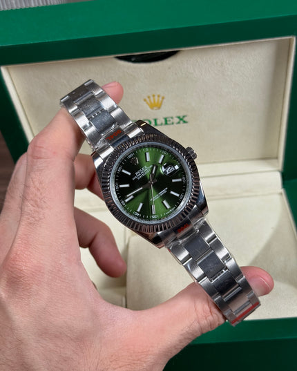 ROLEX DATEJUST PLATEADO - FONDO VERDE BISEL ESTRIADO