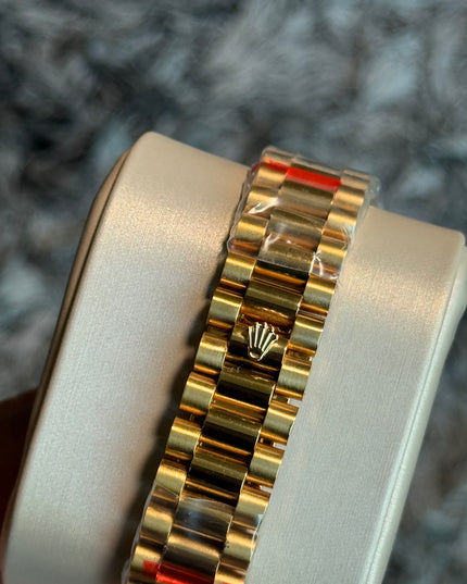 ROLEX DAY DATE II 41mm - BLACK ROMAN DIAL & BEZEM, YELLOW GOLD PRESIDENT BRAZALET