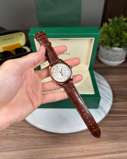 ROLEX CELLINI DATE - ROSEGOLD CAFÉ FONDO BLANCO