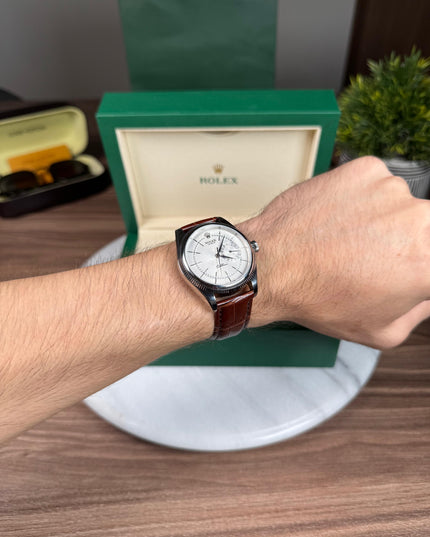 ROLEX CELLINI DATE - PLATEADO CAFÉ FONDO BLANCO