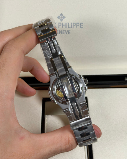 PATEK PHILIPPE NAUTILUS MOON PHASE PLATEADO FONDO PLATA