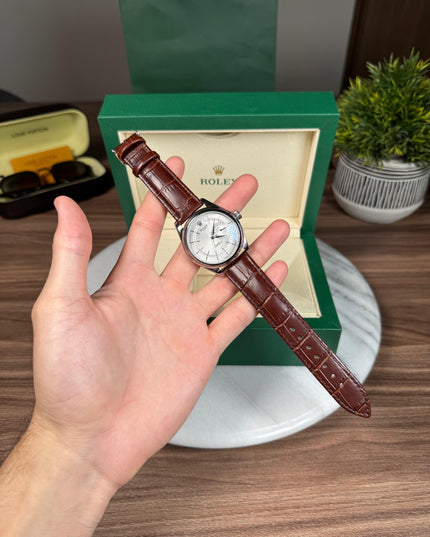 ROLEX CELLINI DATE - PLATEADO CAFÉ FONDO BLANCO
