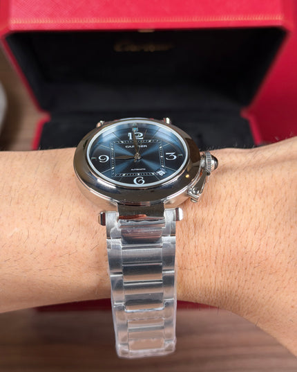 CARTIER PASHA PLATEADO FONDO AZUL